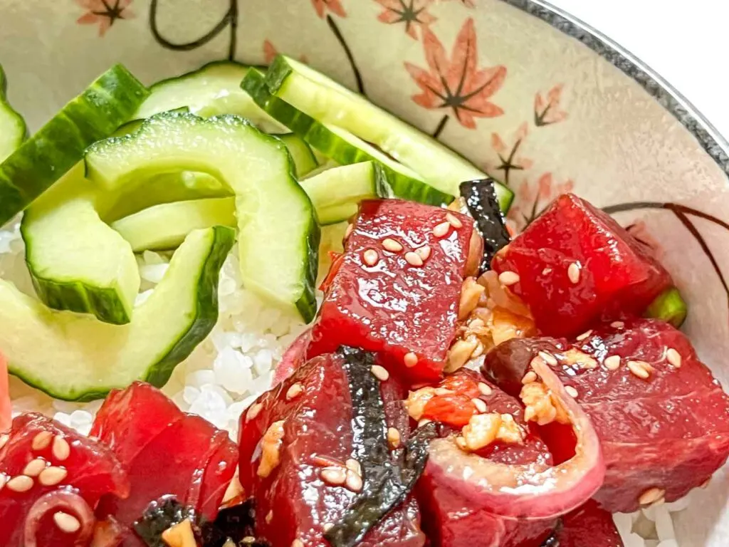 Close up of Tuna Poke and Cucumbers in a Bowl