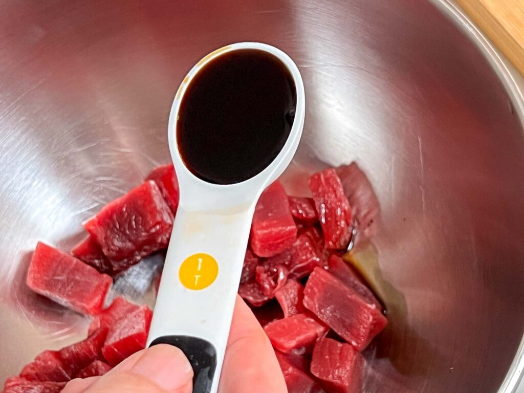 Mixing Soy Sauce into Tuna