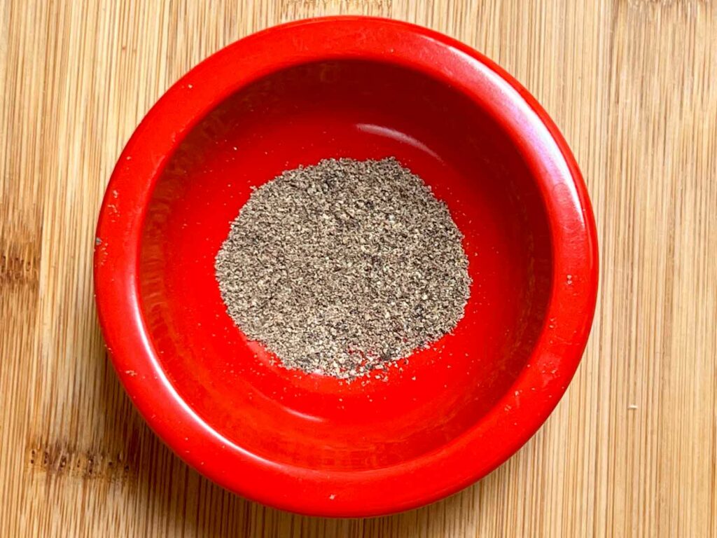 Black Pepper in a small red bowl