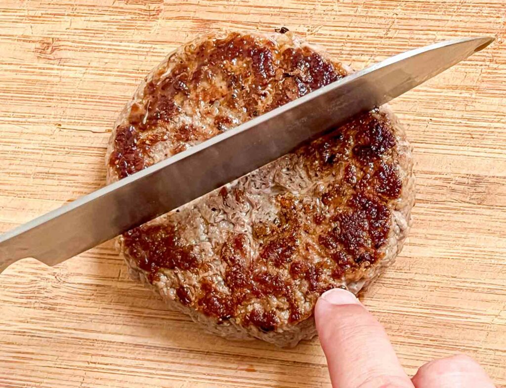 Cutting a burger in half