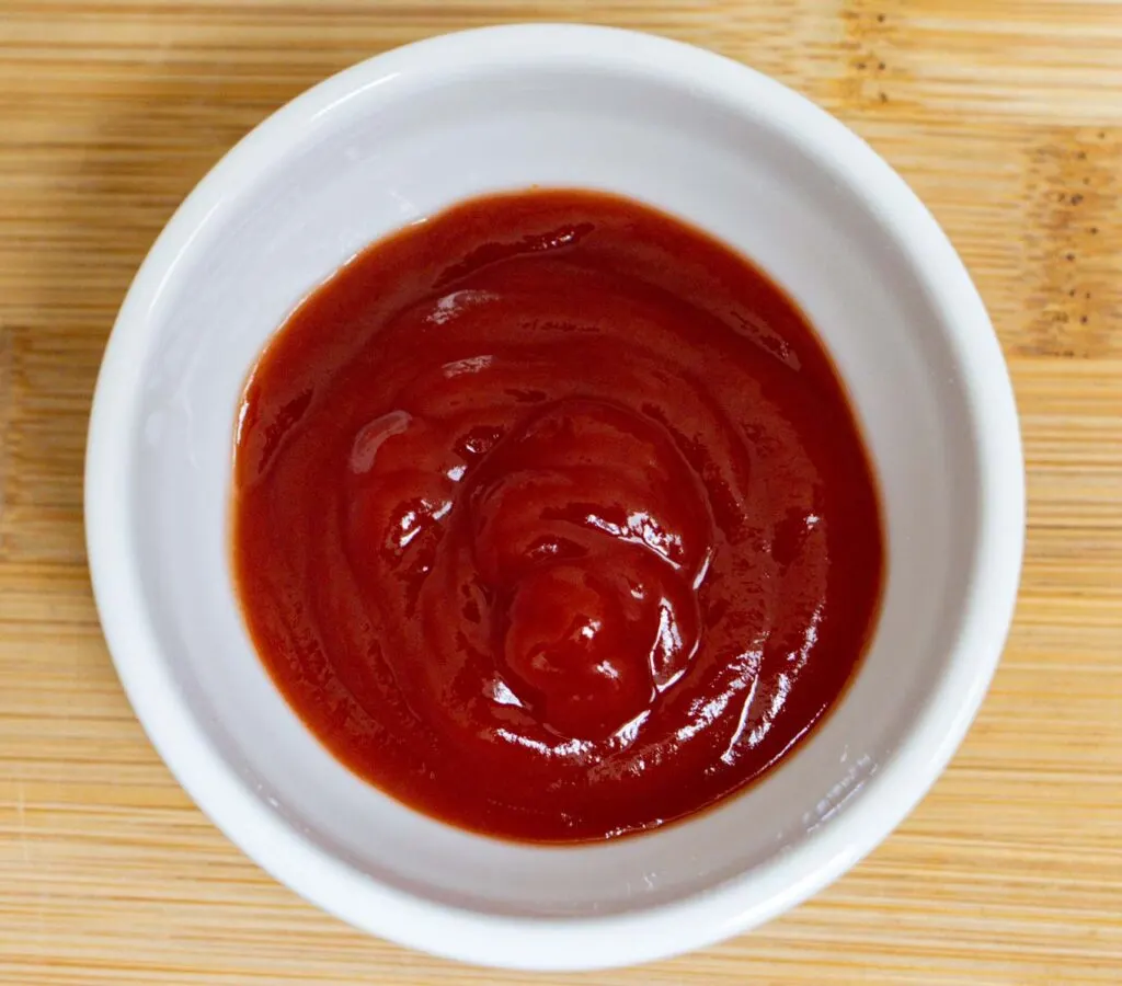 Ketchup in a white bowl