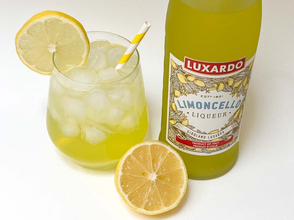 Limoncello Spritz with Limoncello Bottle and Lemon