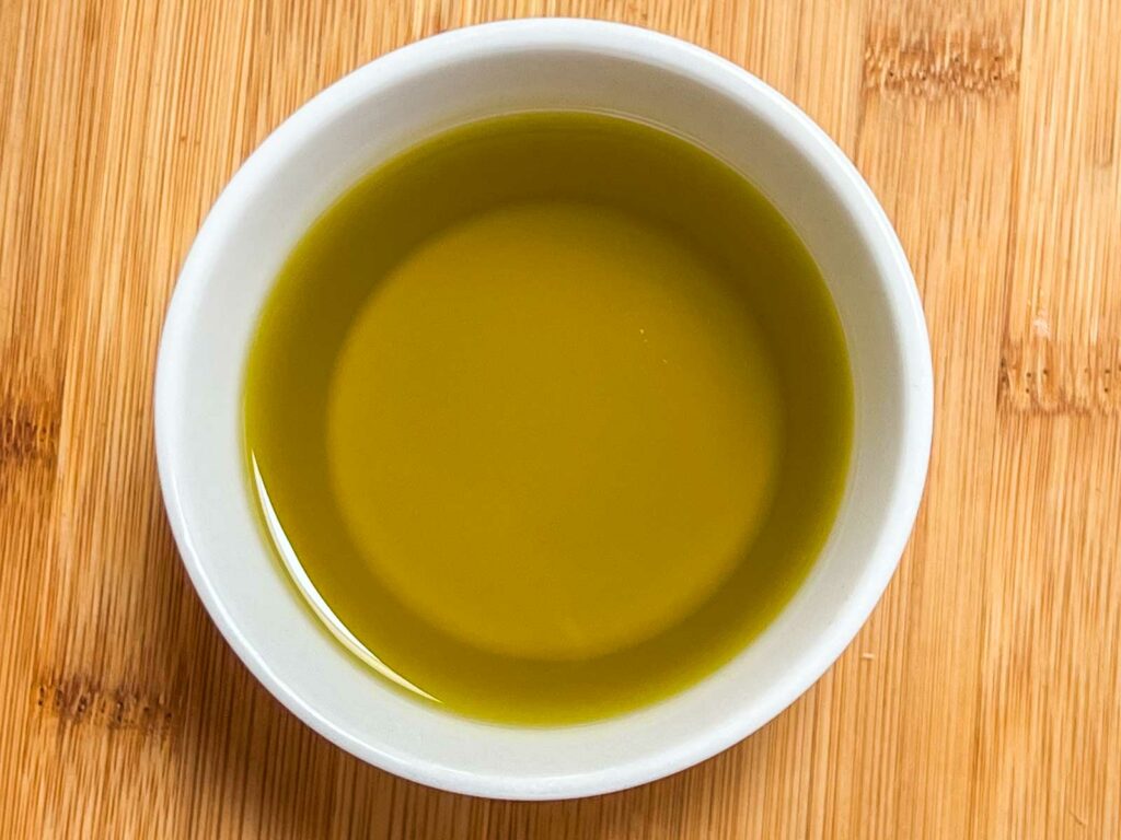 Olive oil in a white ramekin