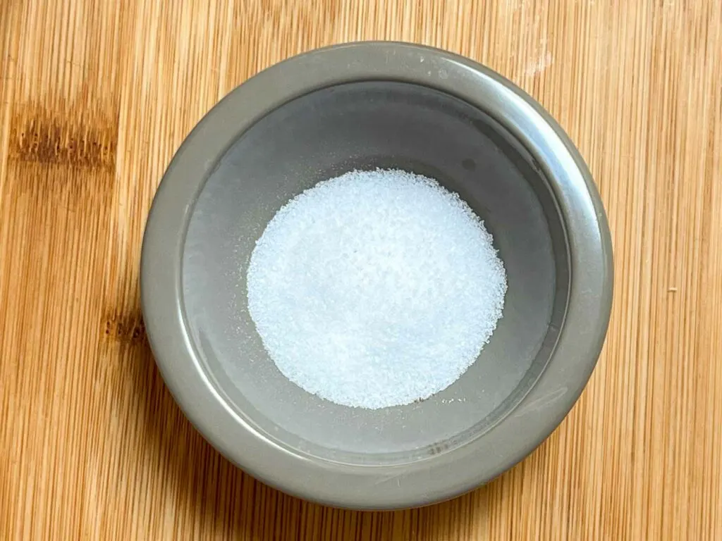 Salt in a small gray bowl