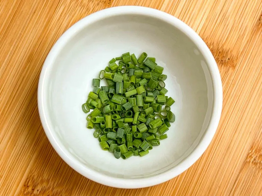 Chopped Chives in a White Prep Bowl