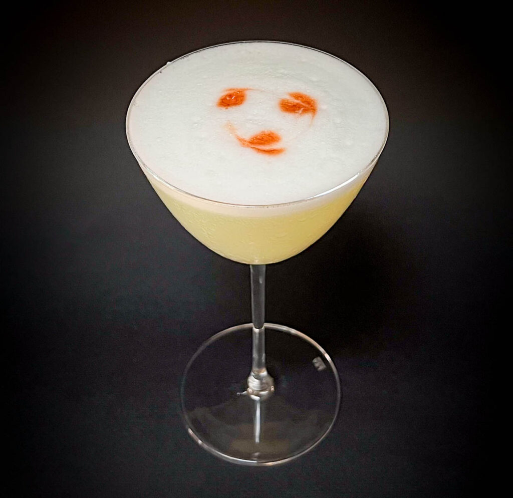 Pisco Sour with Black Background from Above