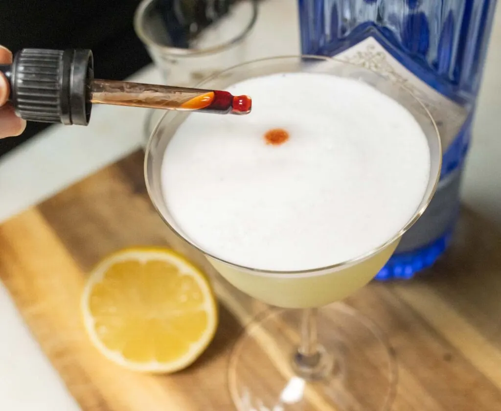 Adding Bitters to Gin Sour Cocktail