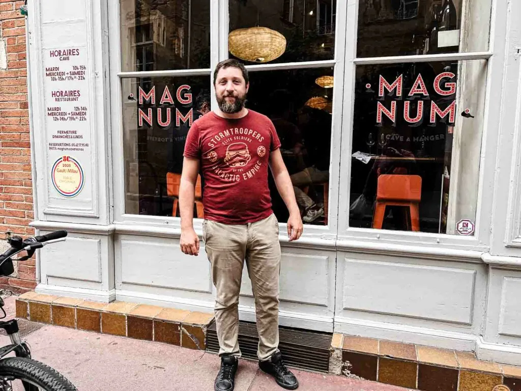 Owner in Front of MAGNUM in Toulouse