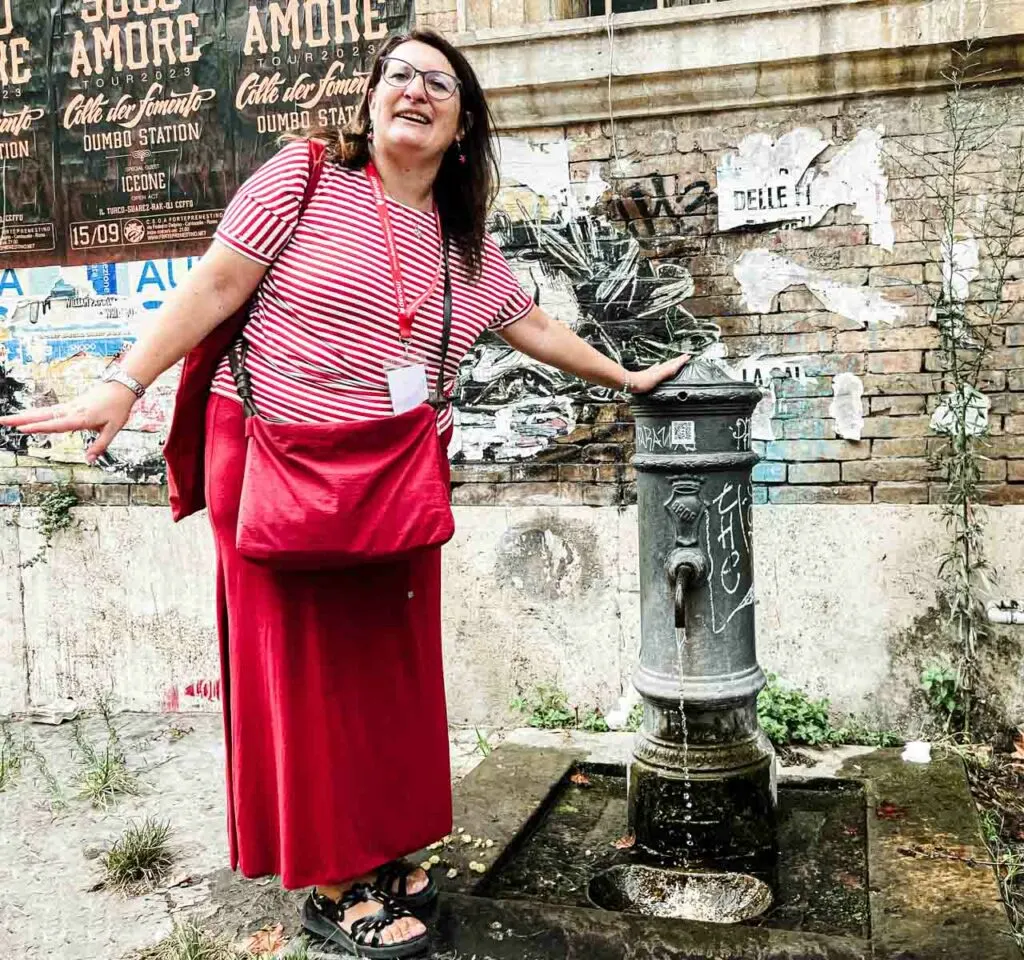 Tour Guide and Water Fountain in Rome