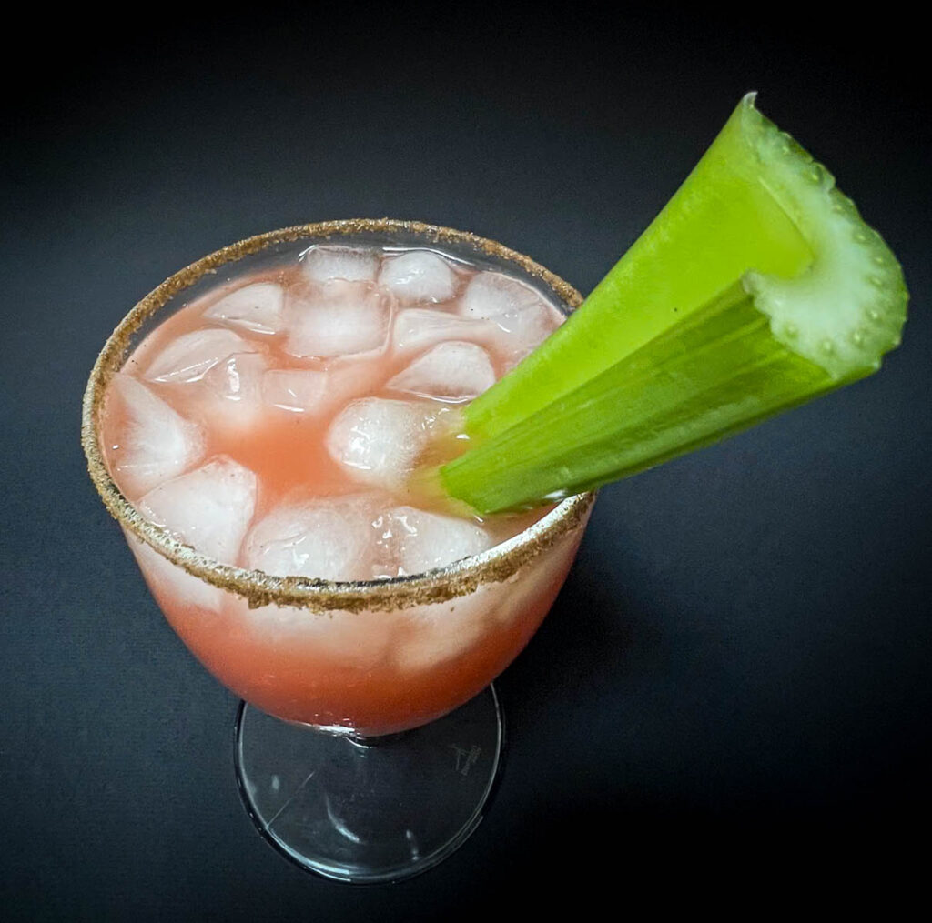 Bloody Caesar Cocktail with Black Background from Above