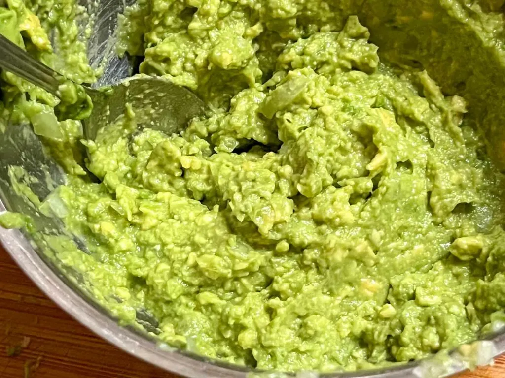Finished Guacemole in a metal bowl