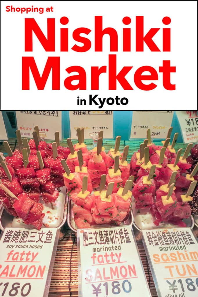 Pinterest image: photo of a Nishiki Market stall with caption reading "Shopping at Nishiki Market in Tokyo"
