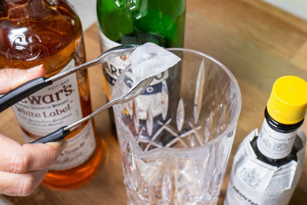 Adding Ice to a Rob Roy Cocktail