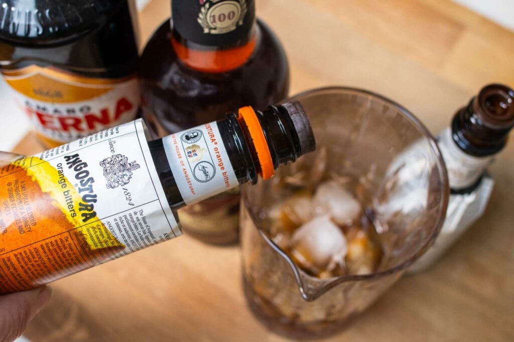 Adding Orange Bitters to a Black Manhattan