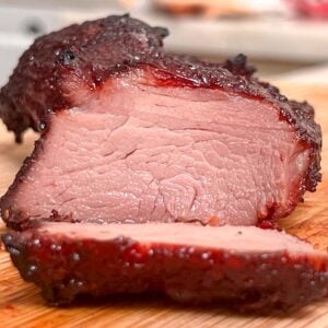 Slice of juicy char siu pork - close up