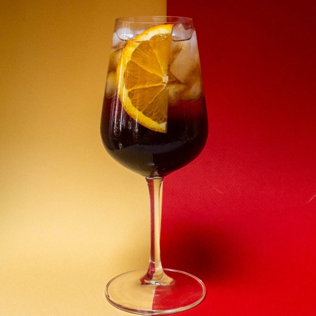 Averna Spritz with Yellow and Red Background