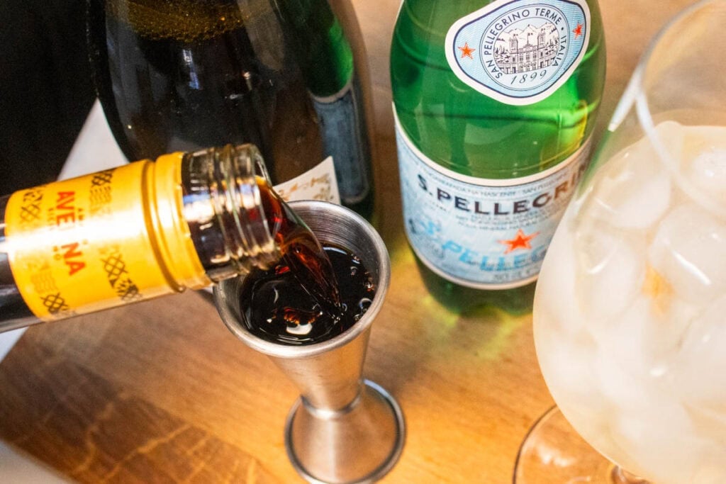 Measing Averna for an Averna Spritz
