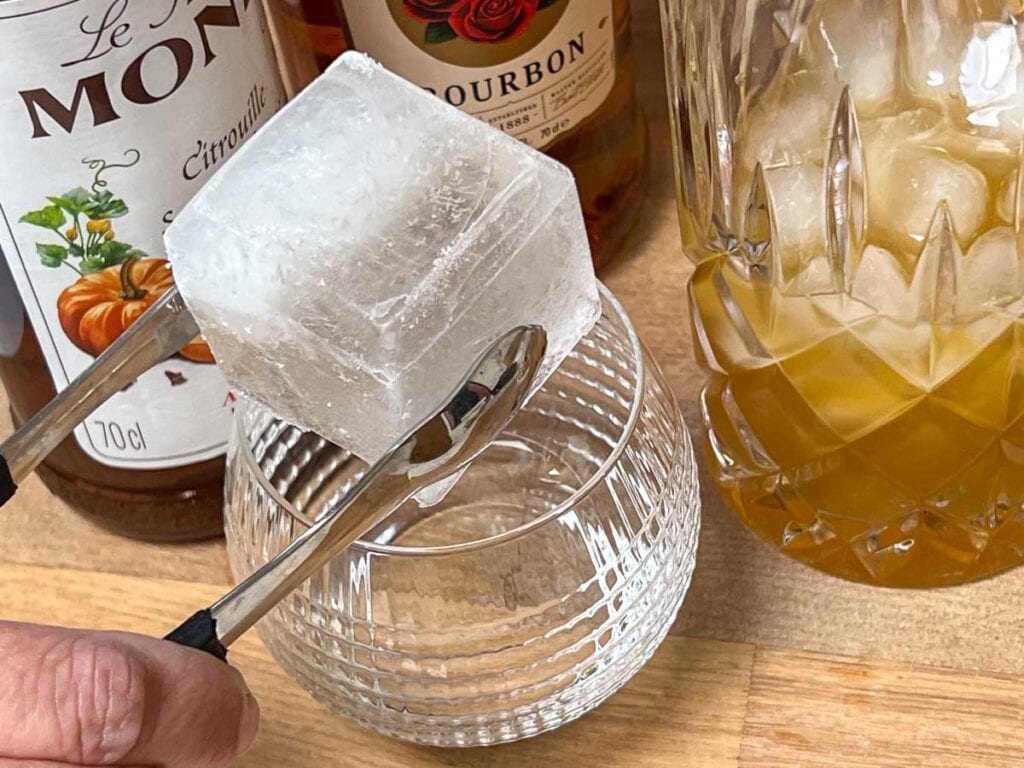 Adding Jumbo Ice Cube to a Pumpkin Bourbon Smash