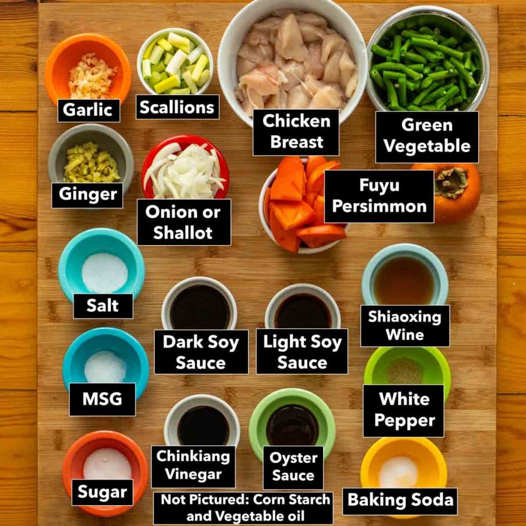 Mise en place for chicken stir-fry with persimmons