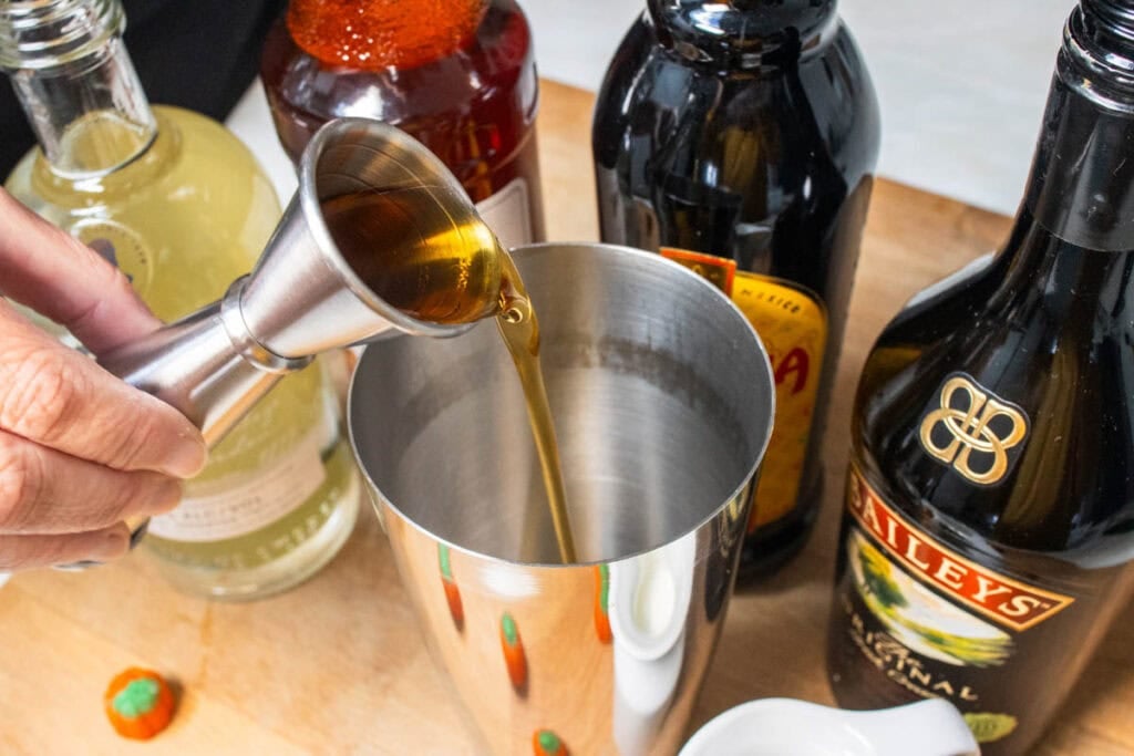 Pouring Pumpkin Spice Syrup into a Pumpkin Spice Martini